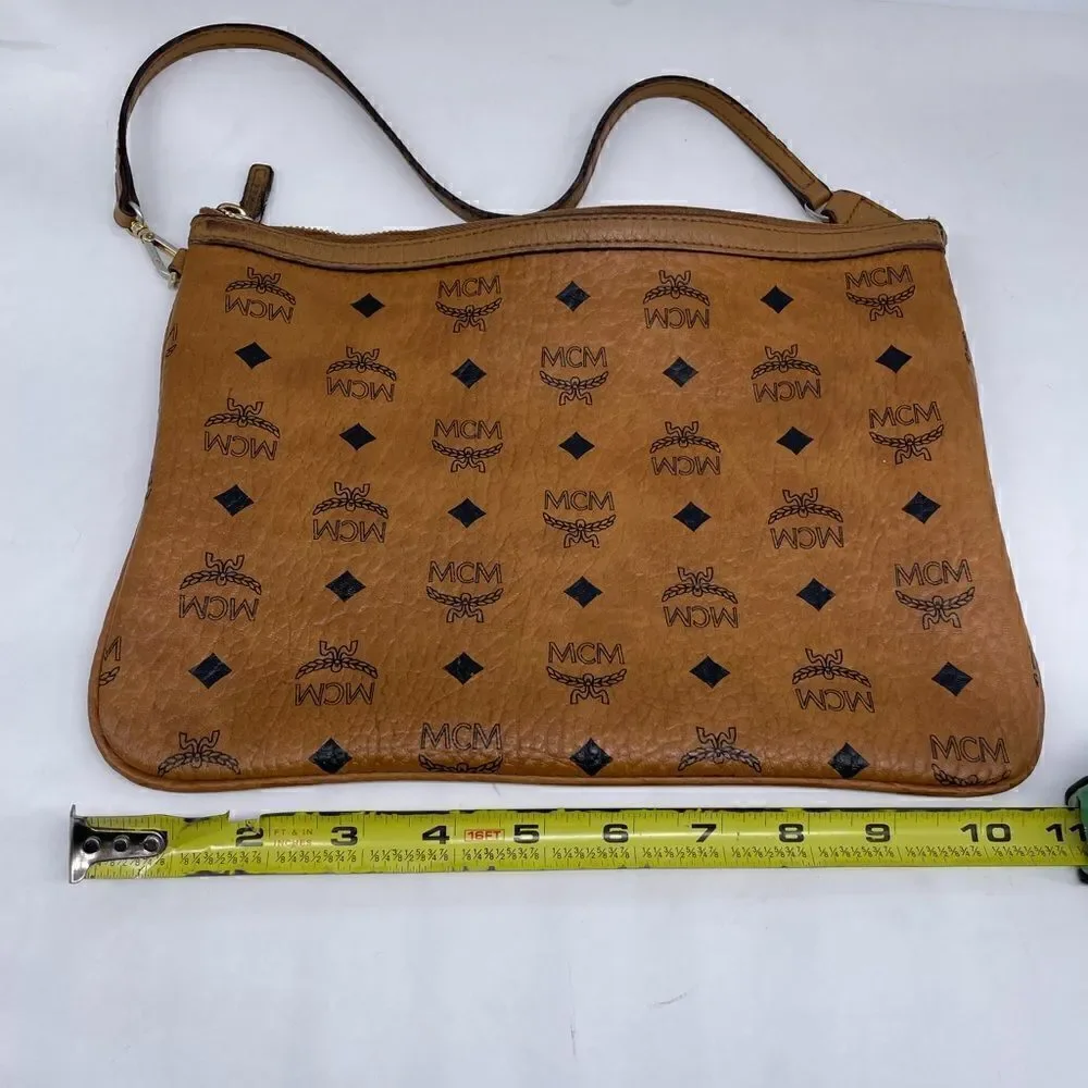MCM authentic Cognac visetos zip Pouch entrupy COA